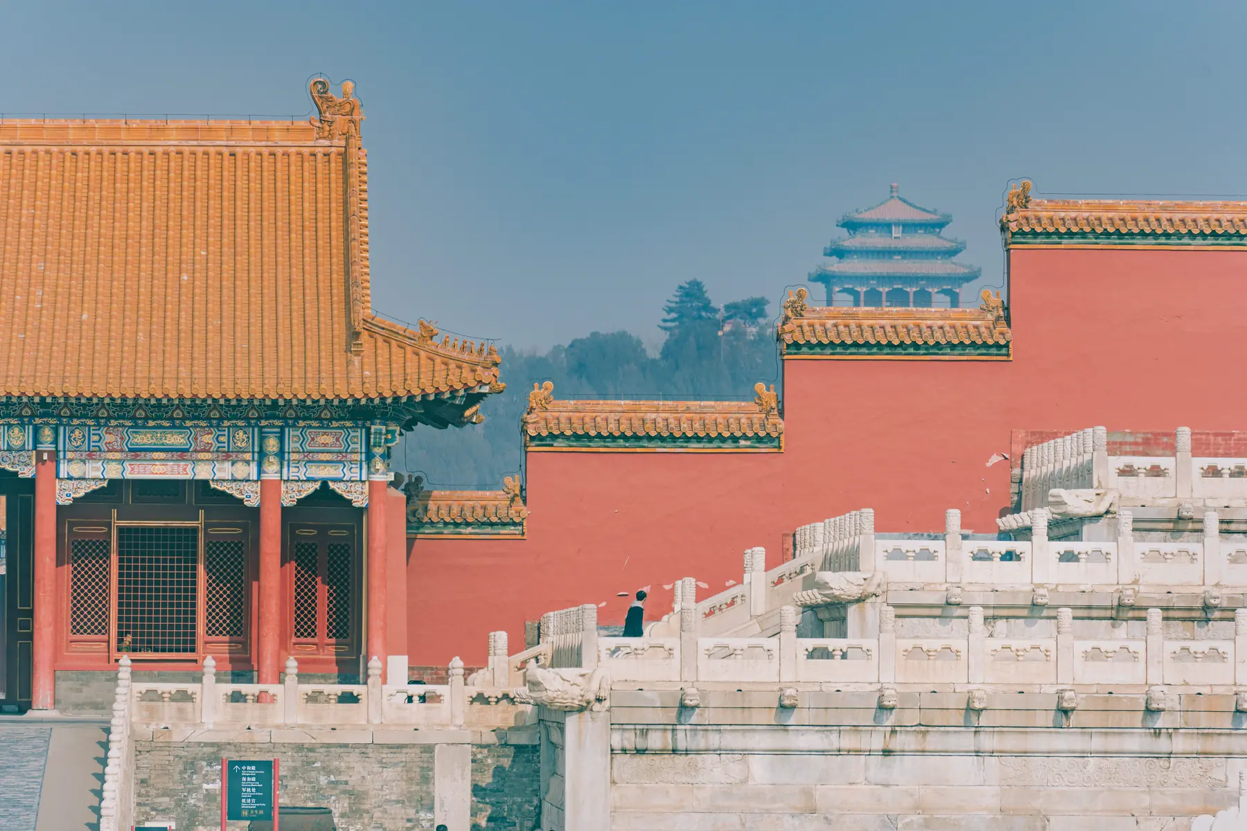 Tiananmen’s red walls, white balustrades and layered roofs