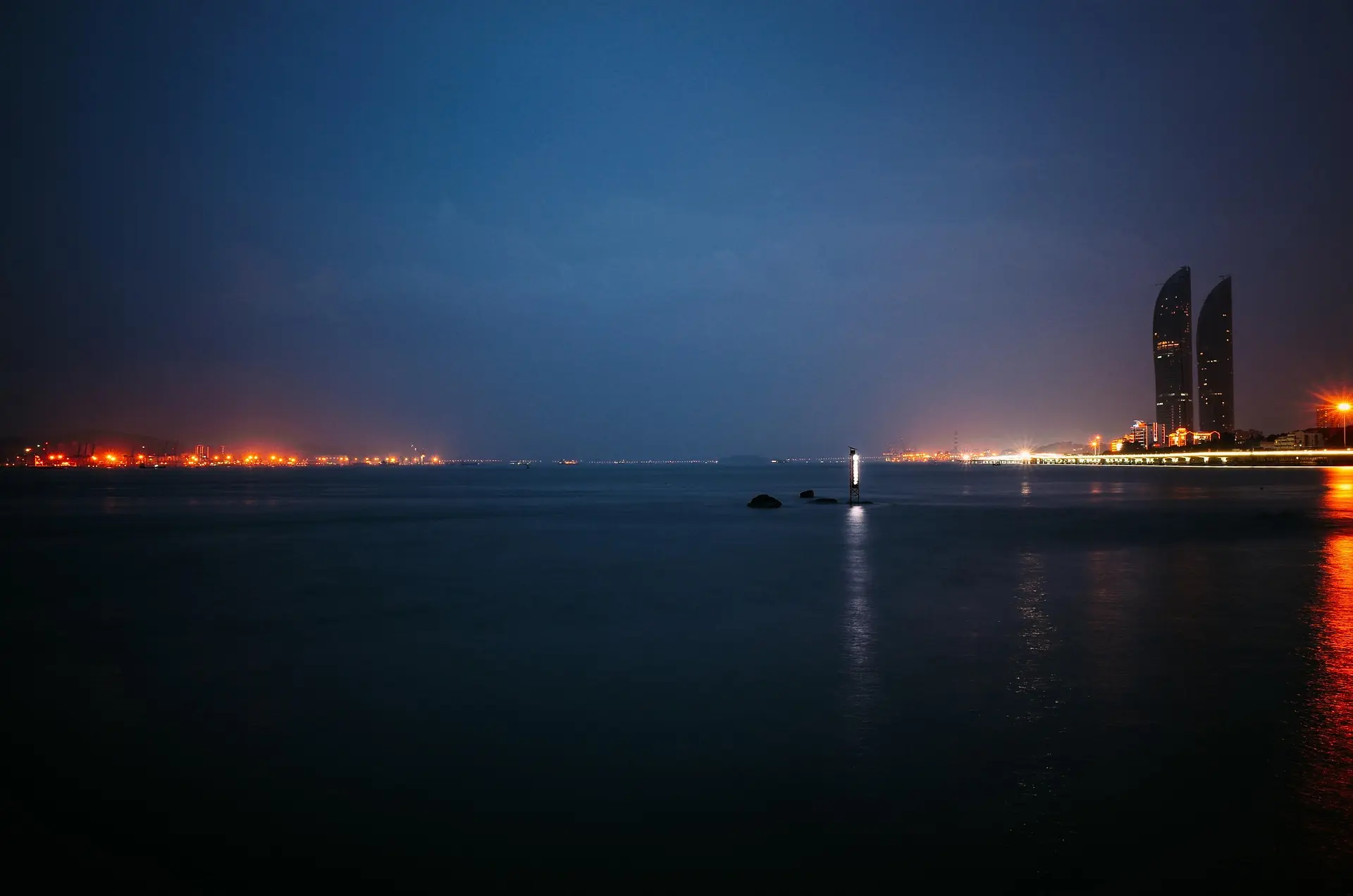 The Xiamen waterfront and twin towers after nightfall