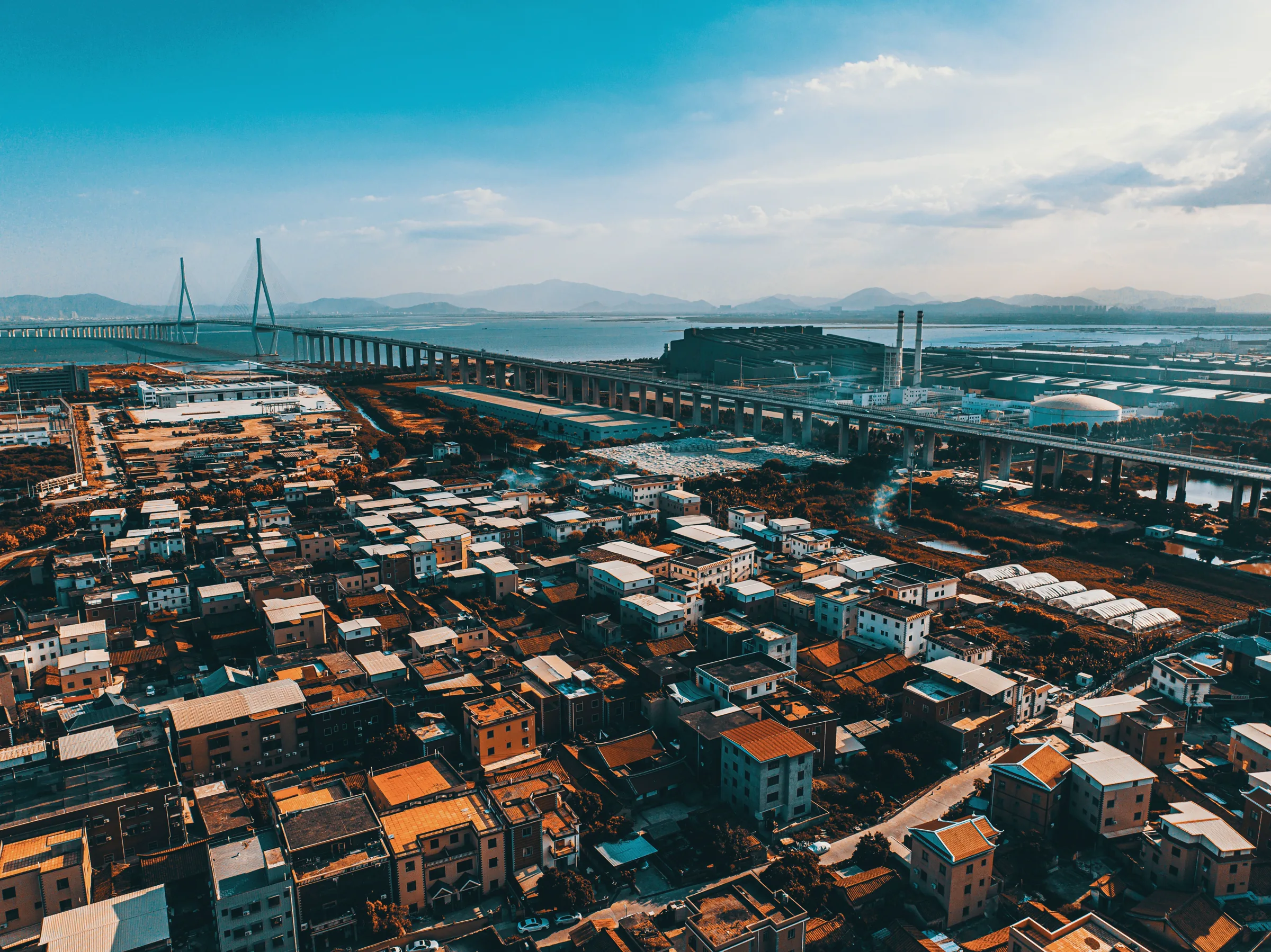 Bridges and tightly packed Xiamen neighbourhoods beside the bay