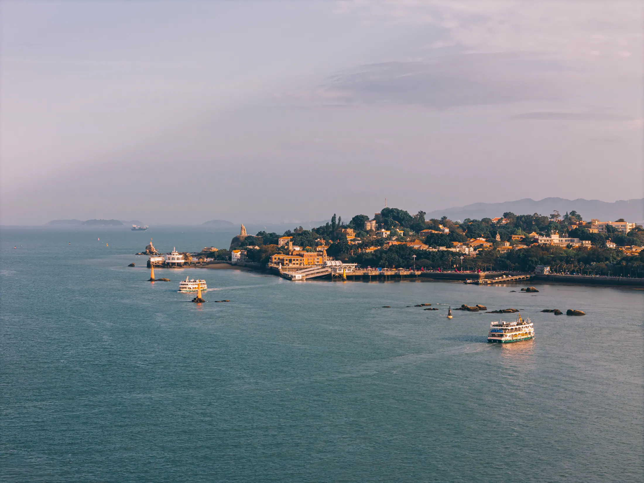 Gulangyu and the Xiamen coast across blue water