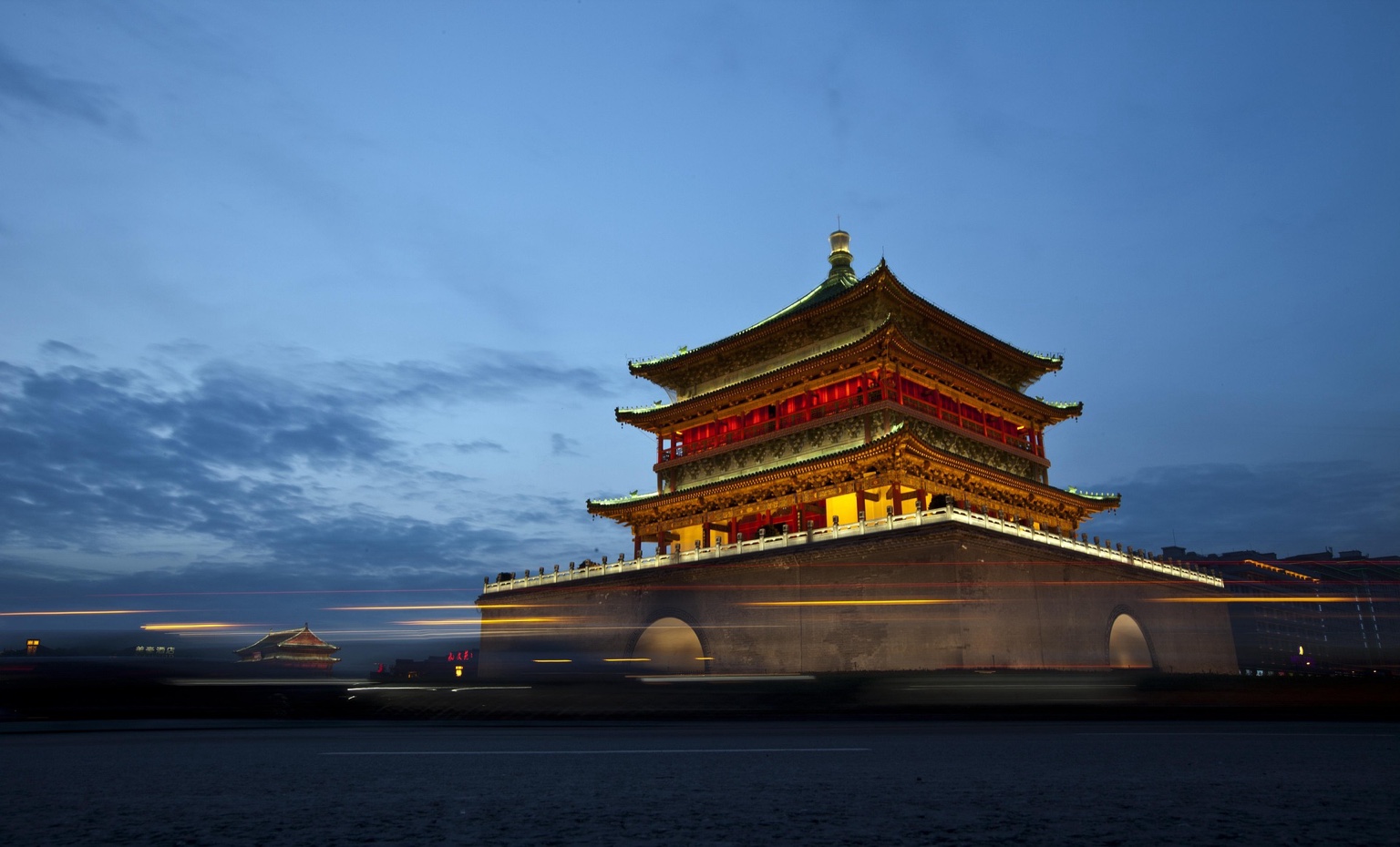 Xi’an Bell Tower at blue hour between city blocks