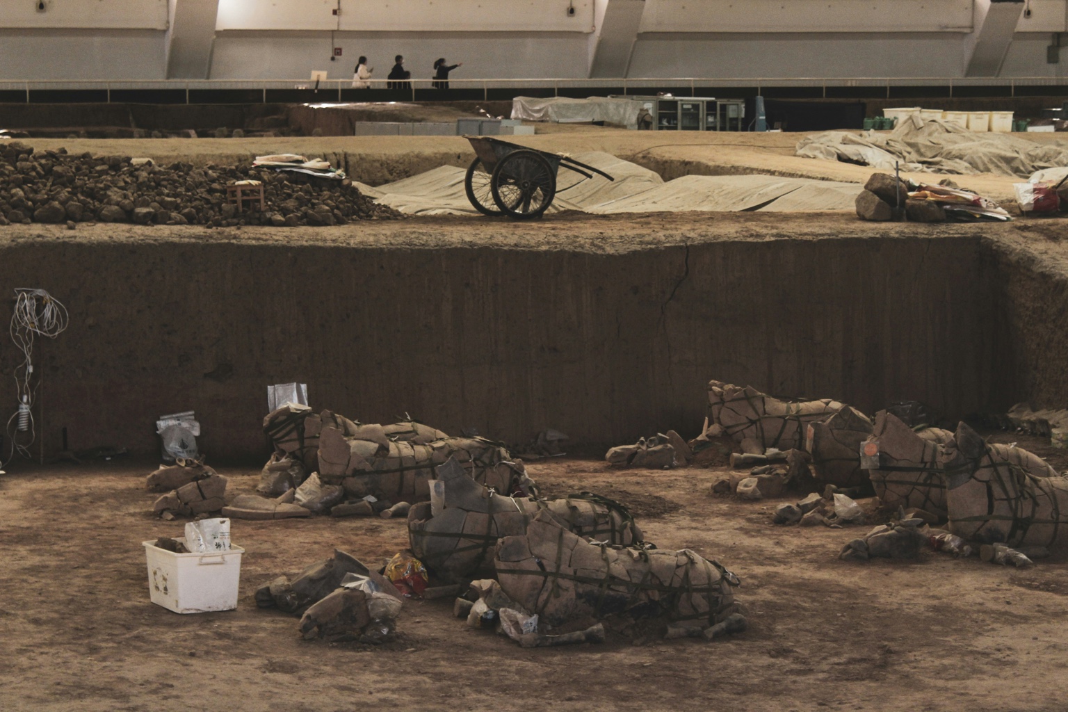 Fragments being mapped and conserved in a Terracotta Army excavation pit